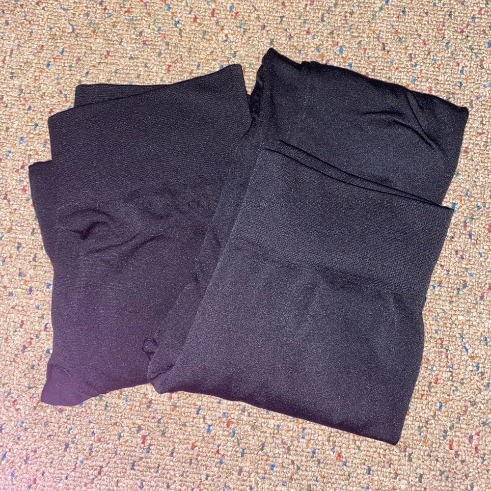 Two pairs of black fleece leggings